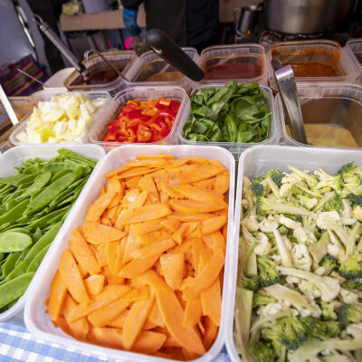 Trays of sliced vegetables for stir fry