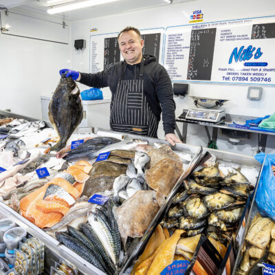 Trader with fresh fish