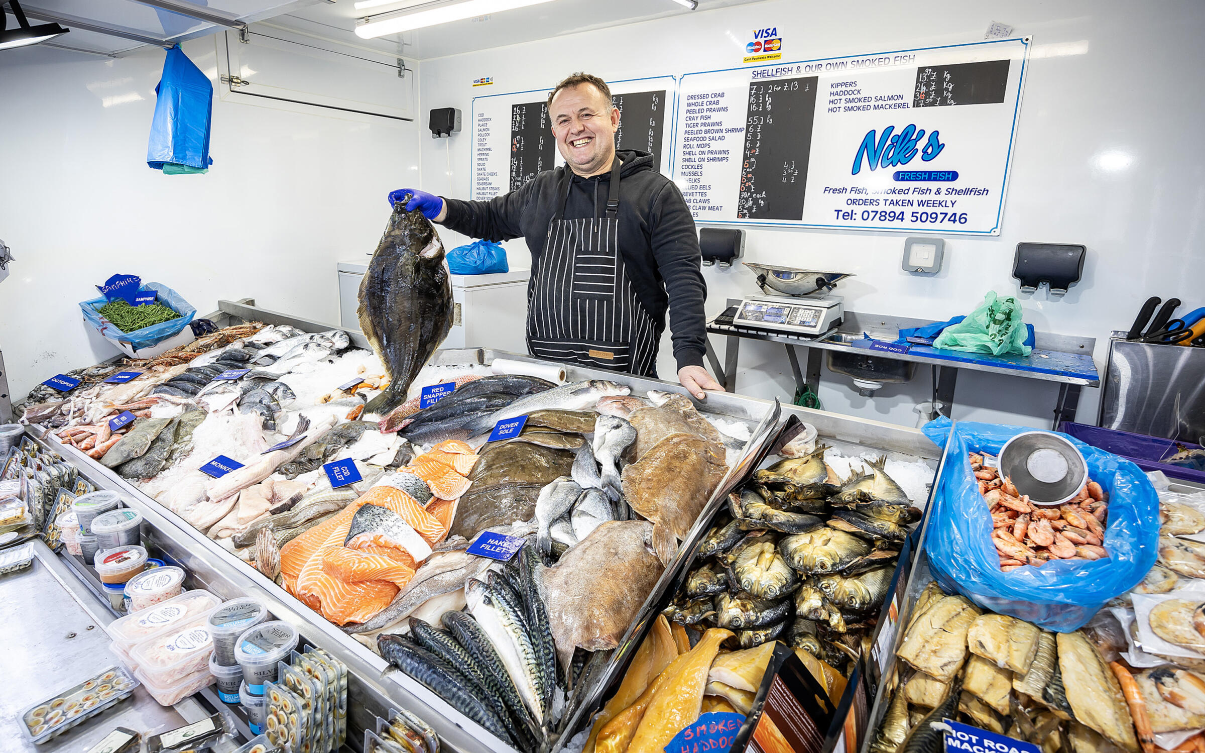 Trader with fresh fish