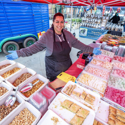 Trader on a stall selling sweet goods