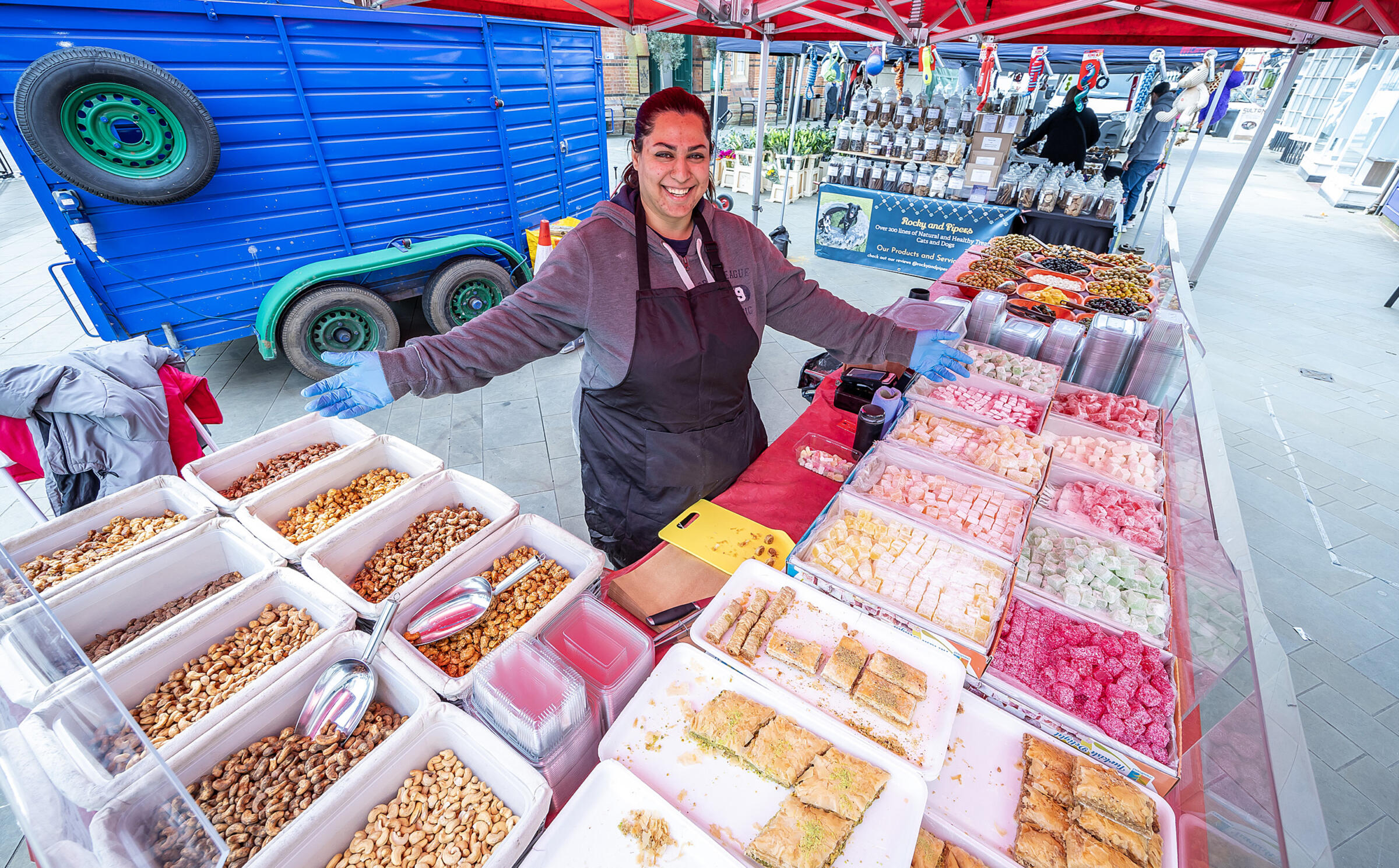 Trader on a stall selling sweet goods
