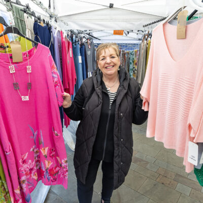Market trader on a clothing stall