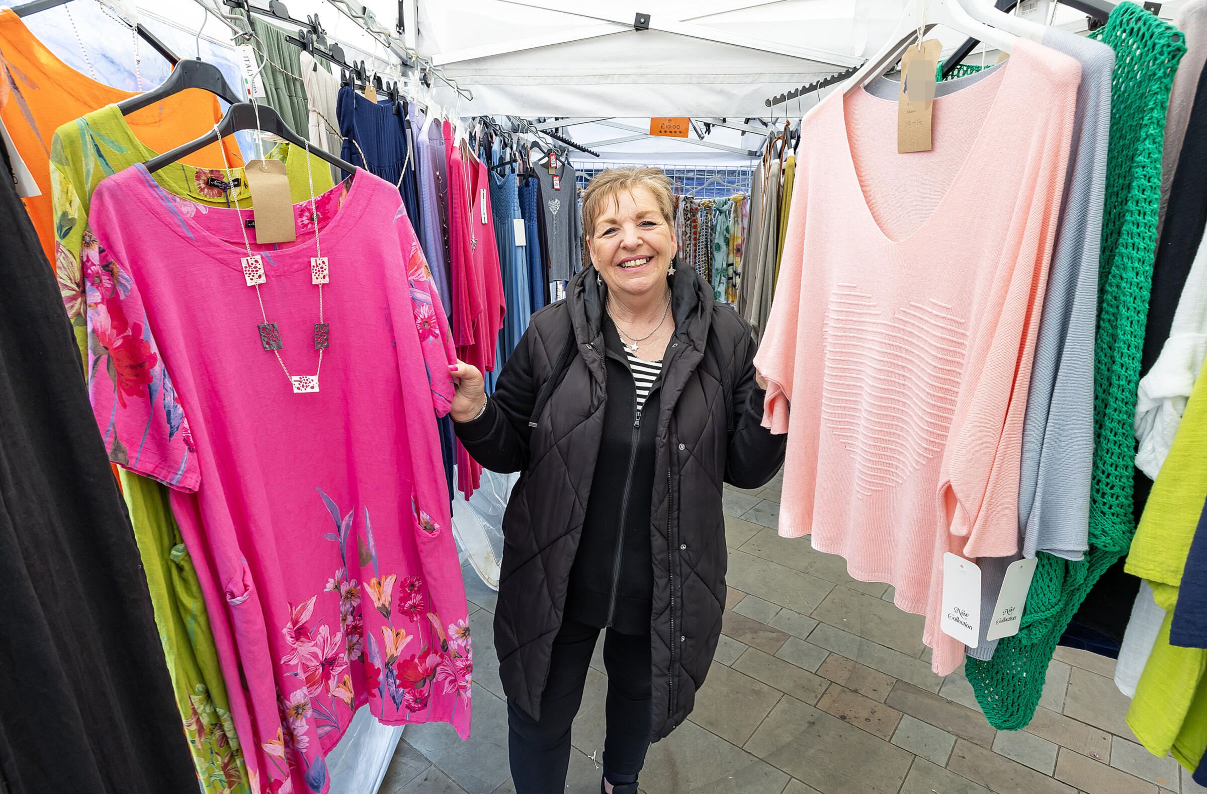 Market trader on a clothing stall