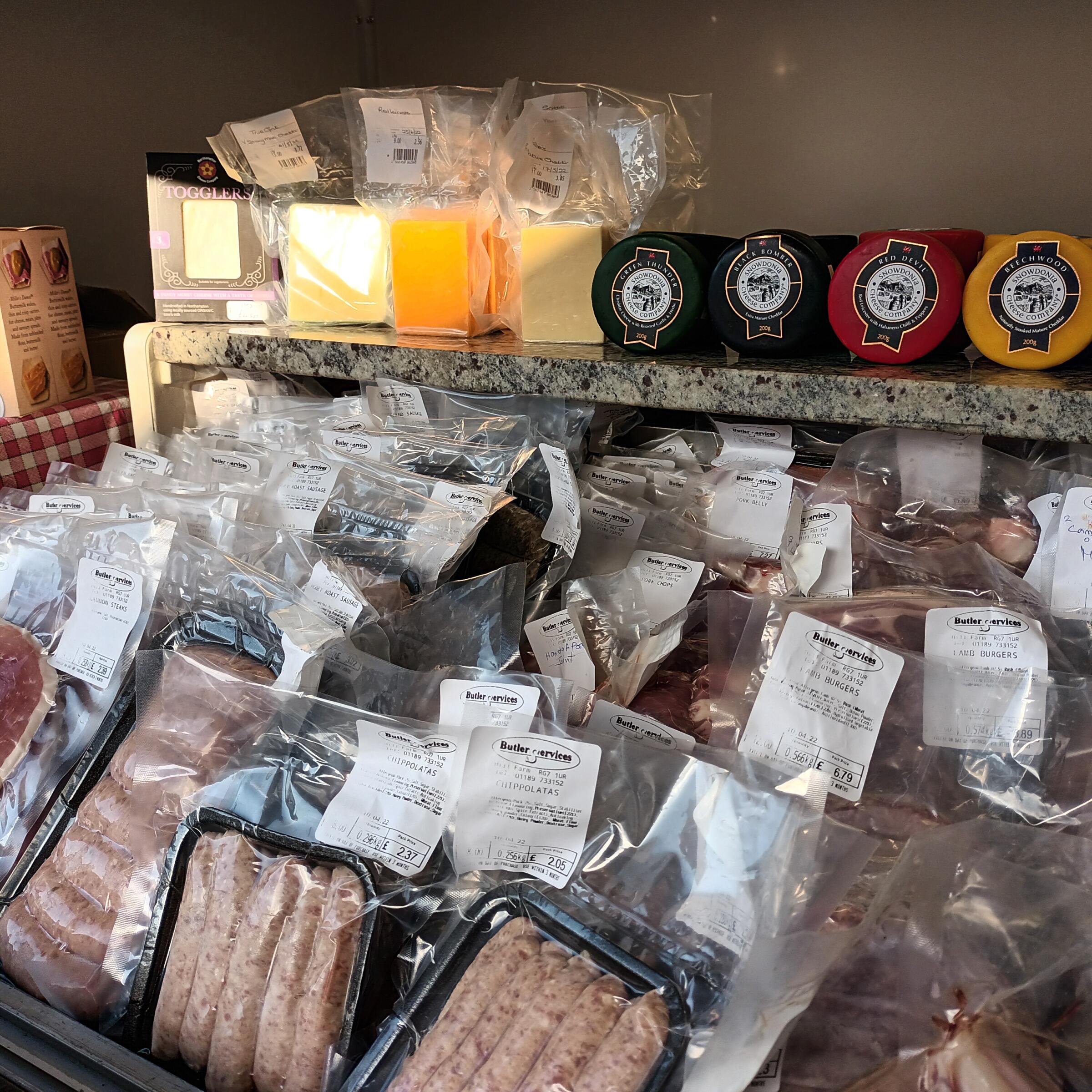 Trays of packed meats and cheeses